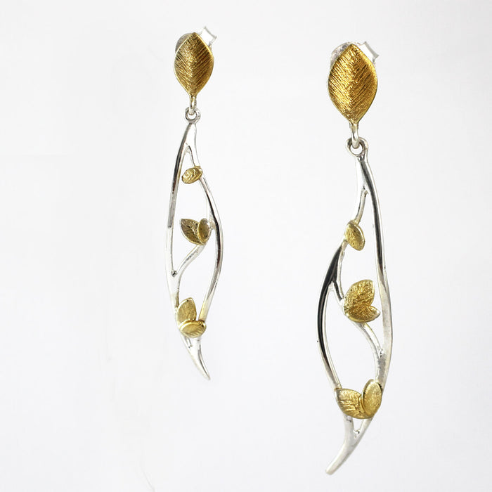 Hanging leaf earrings in gold and silver