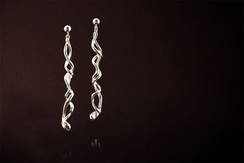 Silver Earrings: Long, Elegant and unique. They have a story to tell..