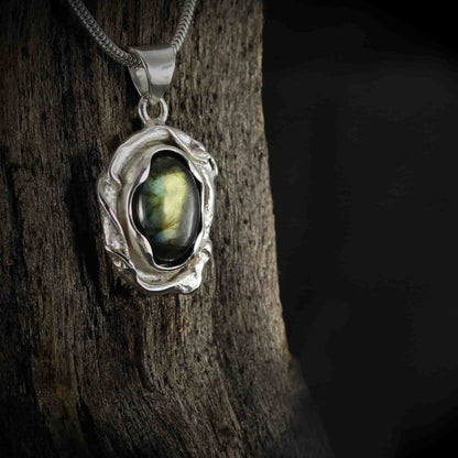 Melted Silver with a beautiful Labradorite Gem
