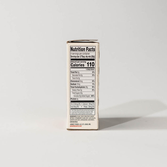 Side view of a single pack of junket simply strawberry ice cream mix on a grey background