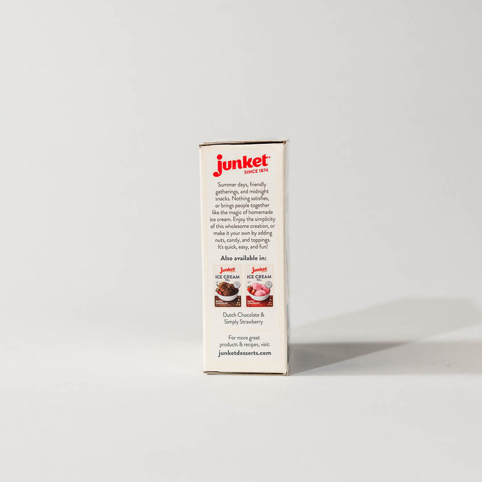 Side view of a single pack of junket very vanilla ice cream mix on a grey background