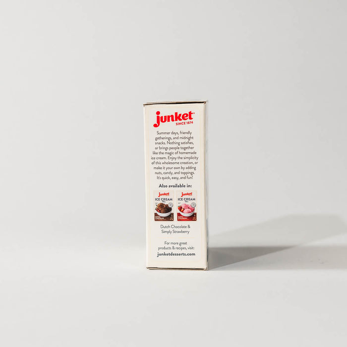 Side view of a single pack of junket very vanilla ice cream mix on a grey background