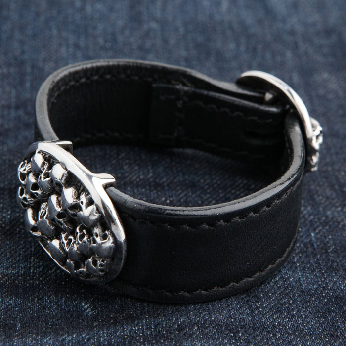 A side-angle view of the biker leather bracelet, showing the 1-inch band and silver skull plate.