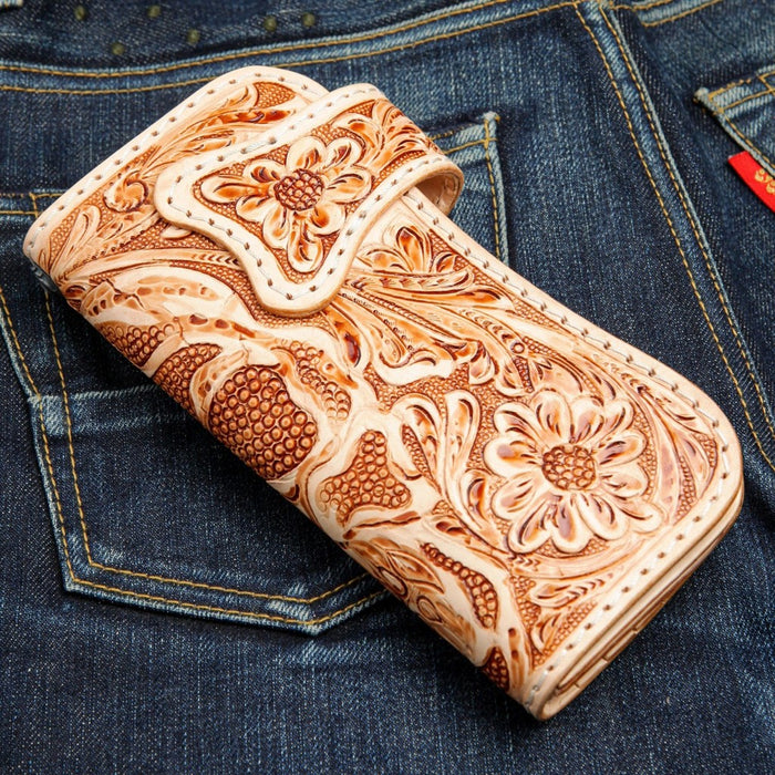 Western floral hand tooled leather long wallet with carved flower design closed view