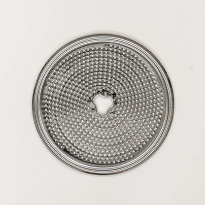 NutriMill slicer shredder replacement disk - fine shredding on grey background