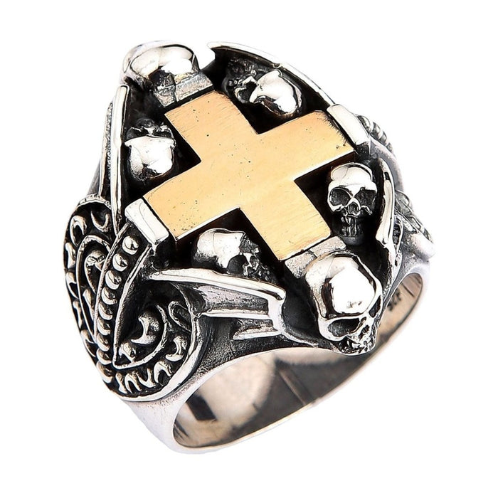 Gothic sterling silver ring with yellow gold cross and skull details front view on white background