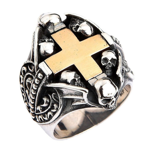 Gothic sterling silver ring with yellow gold cross and skull details front view on white background