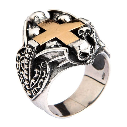 Side profile of Gothic skull cross ring showing ornate filigree shield design