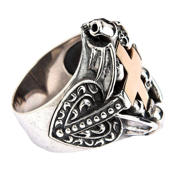 Sterling silver Gothic ring side view displaying intricate scrollwork and skull motifs