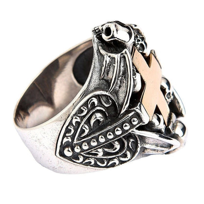 Sterling silver Gothic ring side view displaying intricate scrollwork and skull motifs