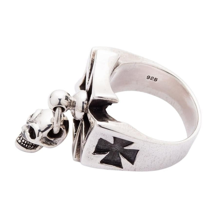 Side profile of the ring showing the thick sterling silver band and cross motif