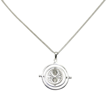 Silver necklace with a round Time Turner pendant on a white background