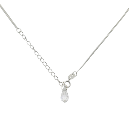 Silver necklace with a teardrop-shaped pendant on a white background