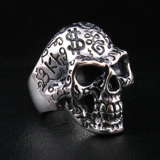 Tattoo skull ring in 925 sterling silver with engraved dollar signs side view