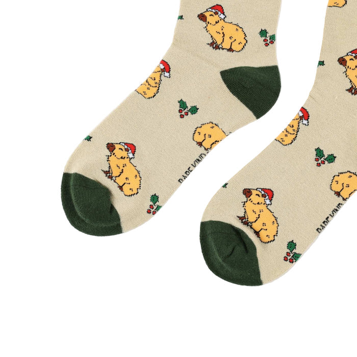 capybara socks with green accents on a white background