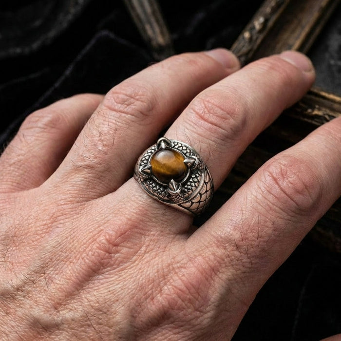 Tiger's eye ring worn on hand demonstrating bold men's statement jewelry size and fit