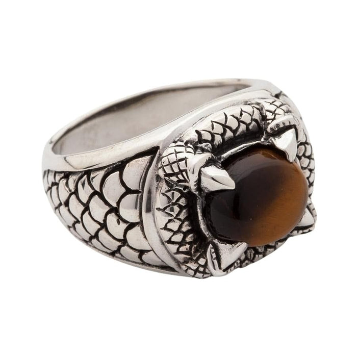 Gothic tiger's eye ring side angle displaying detailed silver claw prongs and scale pattern band