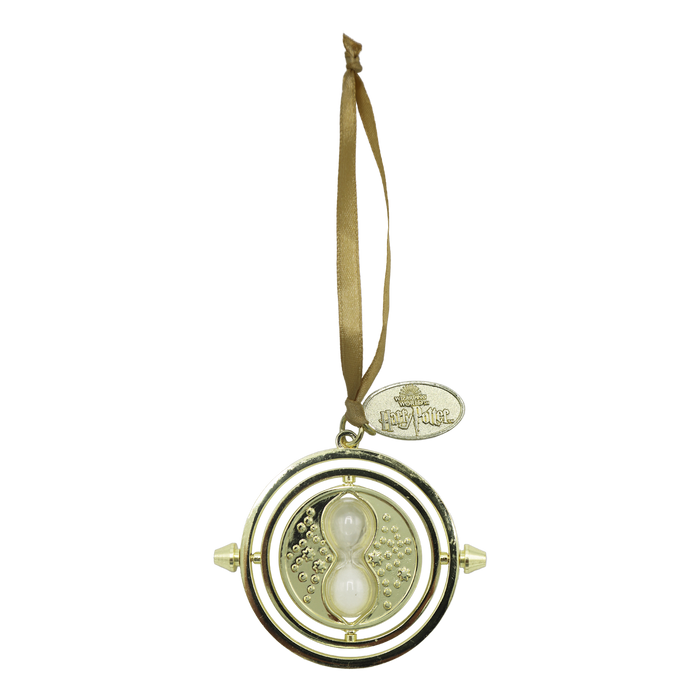 Gold time-turner ornament with a ribbon on a white background