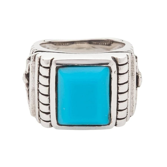 A handcrafted sterling silver eagle ring featuring a genuine turquoise gemstone, showing the quality craftsmanship.