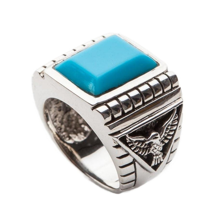 Detailed side view of the men's sterling silver ring, highlighting the intricate carving of a soaring eagle on the band.