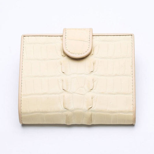 Front view of luxury women's wallet made from genuine white pearl crocodile leather.