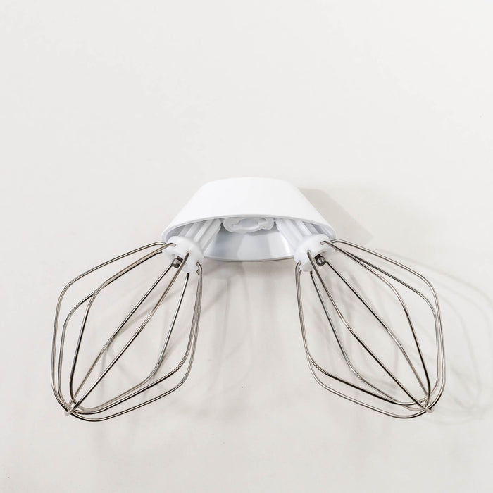 Bosch wire whips attached to a plastic whip driver on a grey background
