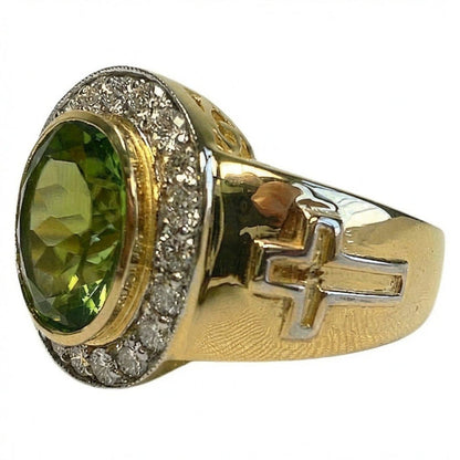 Side view showing raised cross cutout on brushed yellow gold band with bezel-set peridot and CZ halo