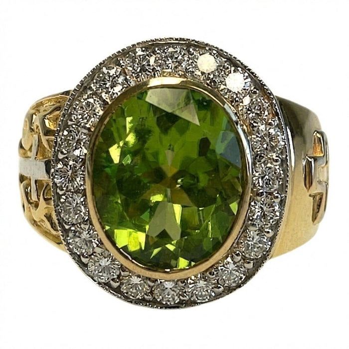 Top-down close-up of oval natural peridot gemstone encircled by diamond-style CZ halo in yellow gold bezel setting