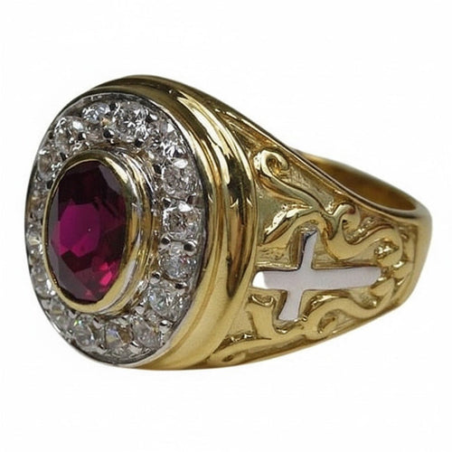 A yellow gold bishop ring for men featuring a prominent red ruby center stone and cross details.