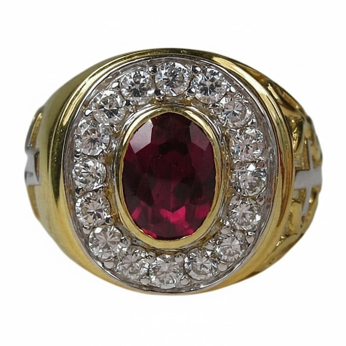 Close-up shot of the oval red ruby stone set in the yellow gold bishop ring.